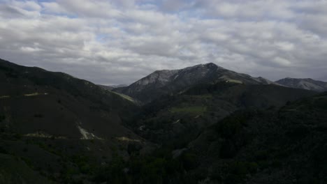 drone shot of pacific coast cliffs in big sur and carmel highlands california
