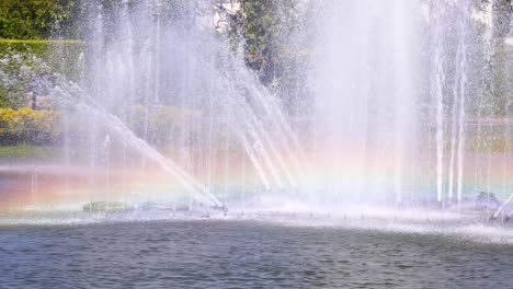 colorful fountain display with a vibrant rainbow