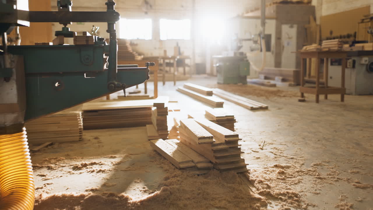 A woodworking shop with lumber and machinery
