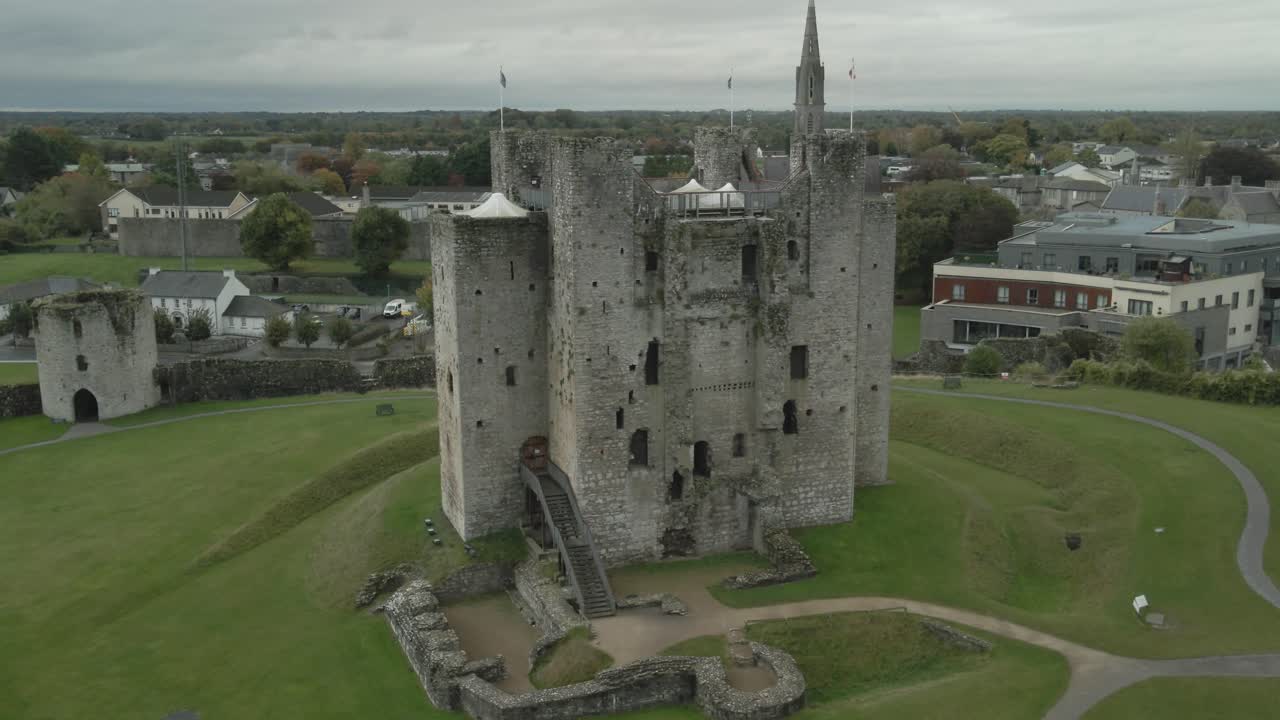 Trim Castle in County Meath Ireland with surrounding town in view captured on an overcast day