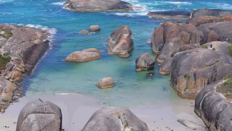 Close-up-drone-shot-panning-around-Elephant-Rocks-in-Western-Australia