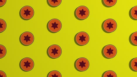 rotating orange slices. pattern on yellow background