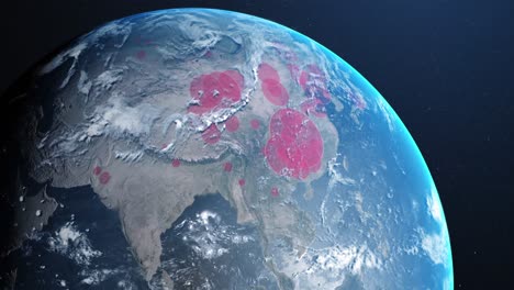 animation of the planet earth spinning around and countries turning red through circles in a blue da