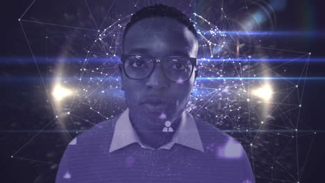 animation of portrait of businessman against network of connections spinning