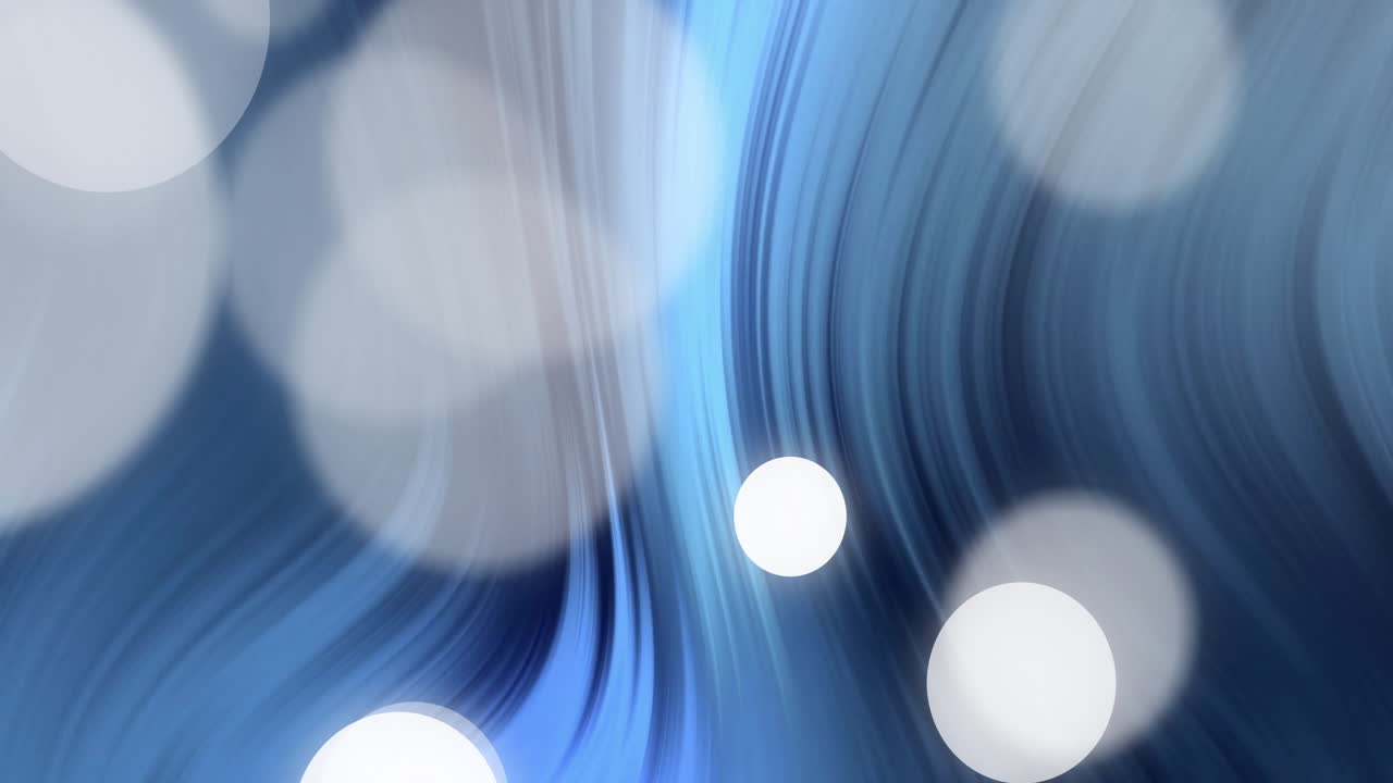 Animation of white spots and blue shapes on black background