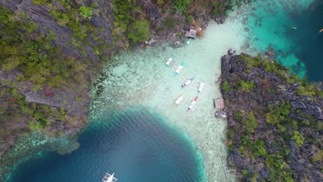 4k drone video of twin lagoon, the popular tourist spot near coron in palawan, philippines