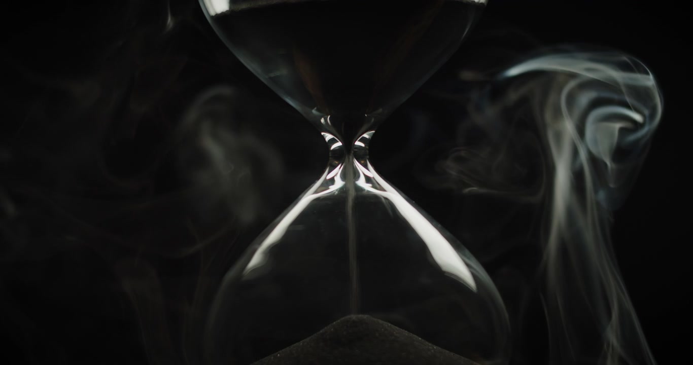 And hourglass and smoke fading out