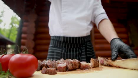 chef preparing a sliced rib eye steak