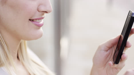 closeup woman hands using touchscreen tablet smartphone device