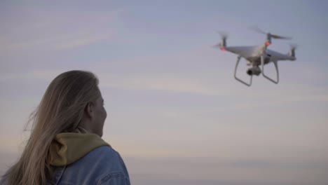 flying above sea copter checking video of girl