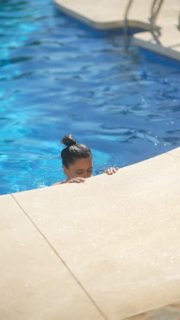 woman swimming in a pool