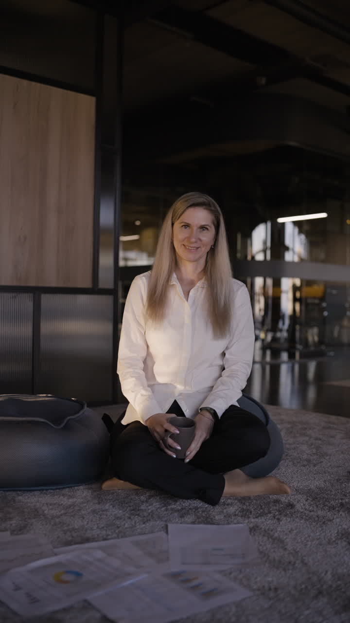 Business Woman Relaxing in Modern Office