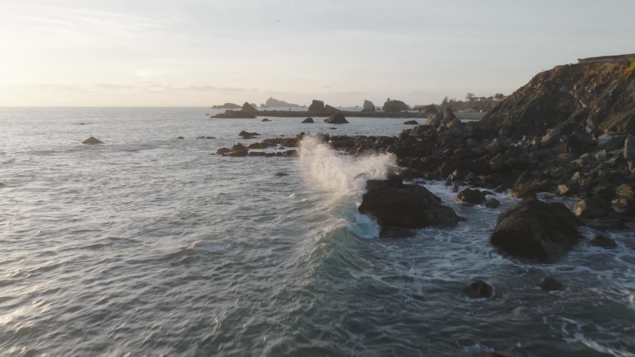 Epic Aerial of Northern California Coastline with Rocks, Cliffs, Forest and Waves