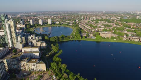 Aerial-Drone-Image-of-tall-glass-apartment-buildings-in-Woodberry-Down,-London,-England-on-a-sunny-day