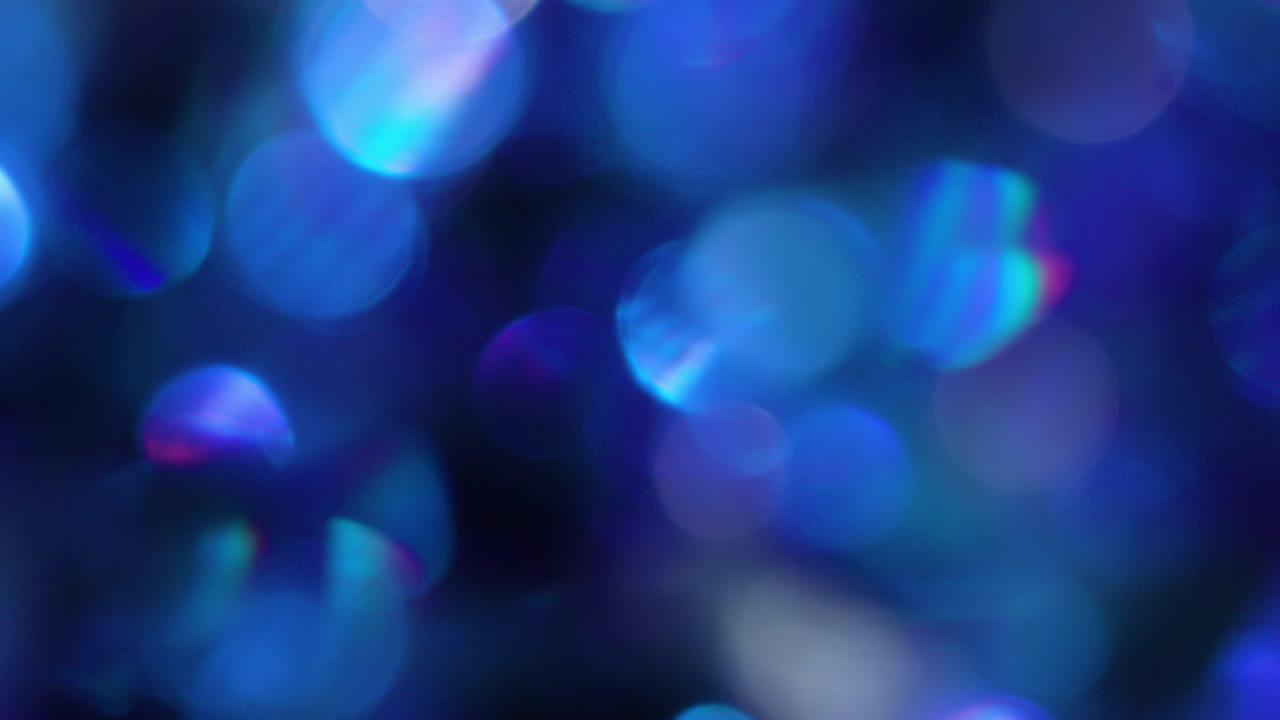 la rotación de los círculos bokeh en el sentido de las agujas del reloj