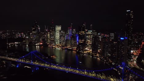 Establishing-drone-shot-of-Brisbane-City,-with-Story-Bridge-and-Howard-Smith-Wharves-in-foreground