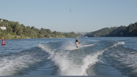 woman waterskiing on a river