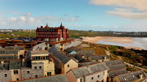 aerial drone shot over the headland hotel located on cornwall's idyllic coastline