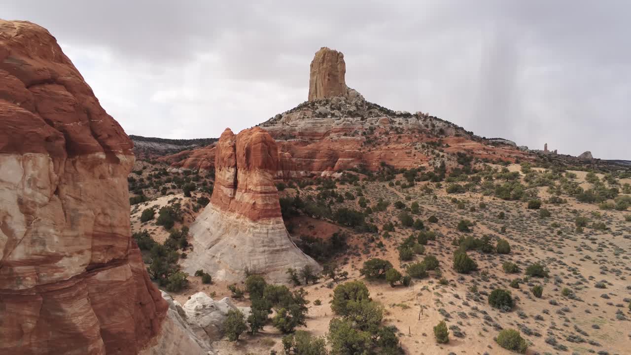 Pull Back Aerial View of Butte Rock Formations in Arizona Desert