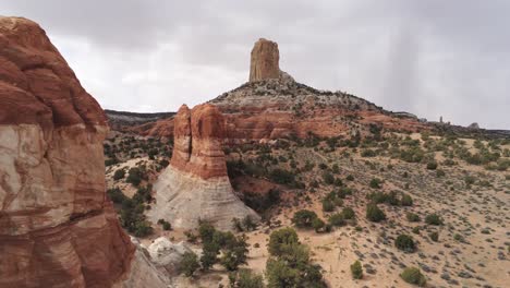 Pull-Back-Aerial-View-of-Butte-Rock-Formations-in-Arizona-Desert