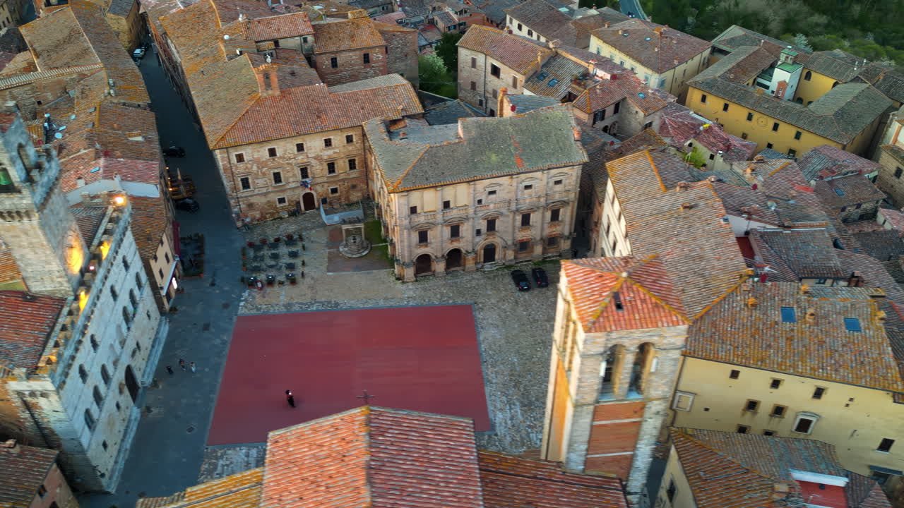 Aerial drone view of the Montepulciano medieval hilltop town in Tuscany, Italy, surrounded by vineyards