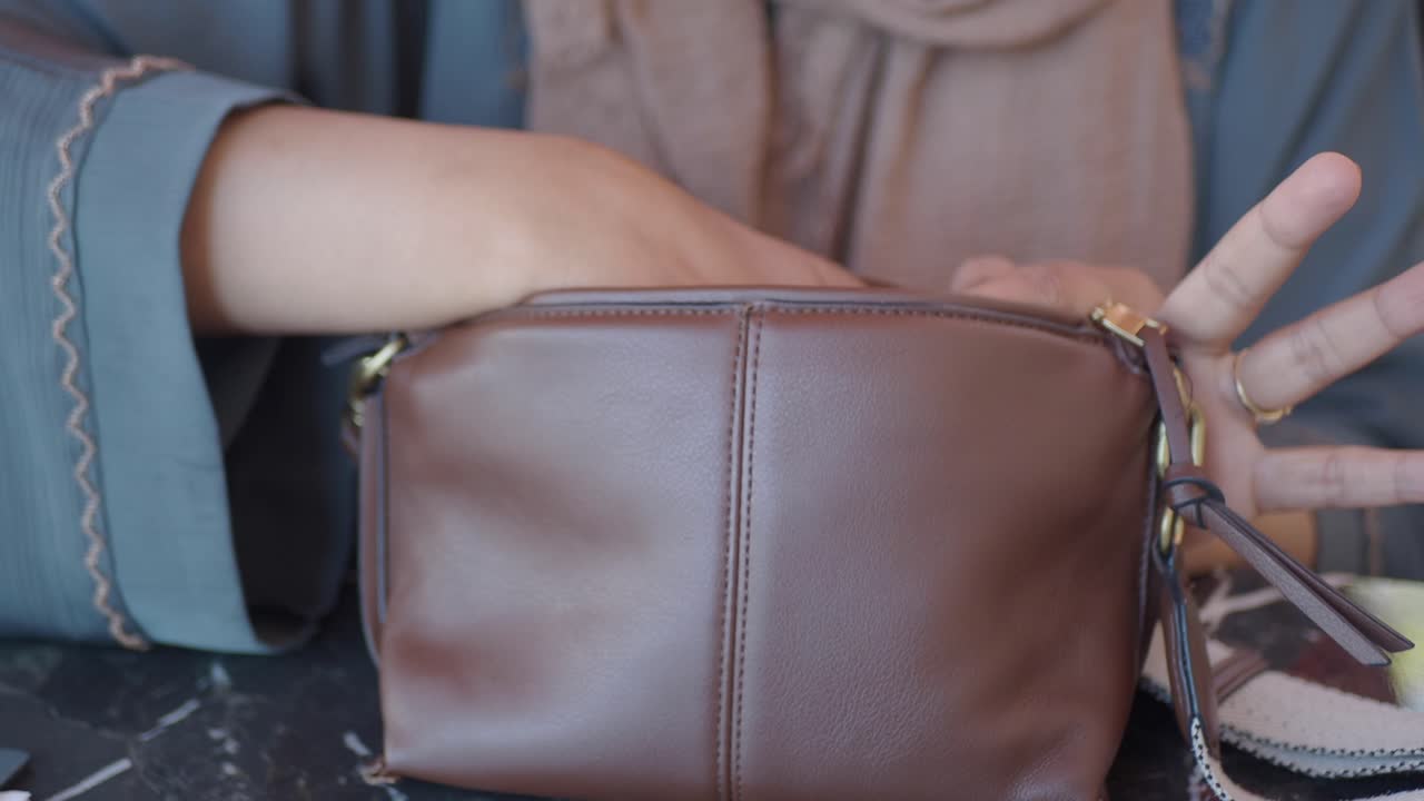 Woman Checking Her Bag