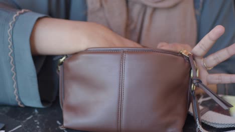 woman checking her bag