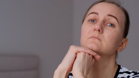 portrait of a woman with a sad expression