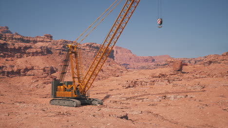 yellow crane in a desert landscape