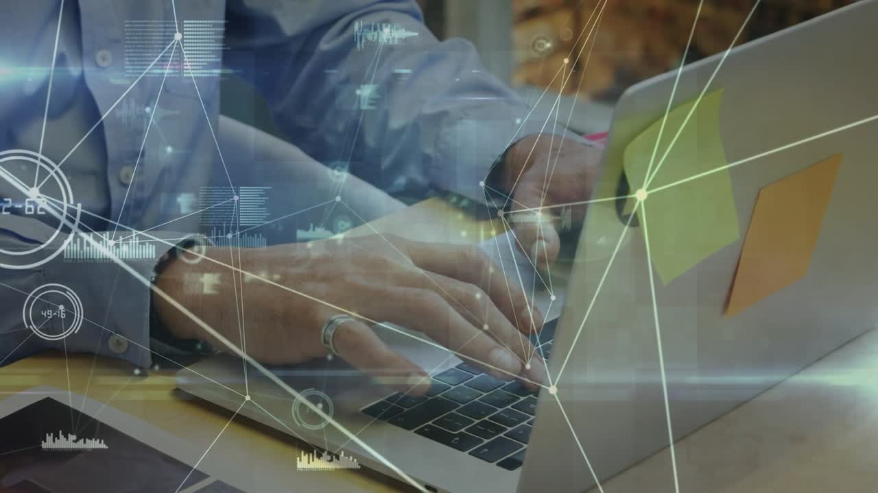 Animation of data processing over caucasian businessman using laptop