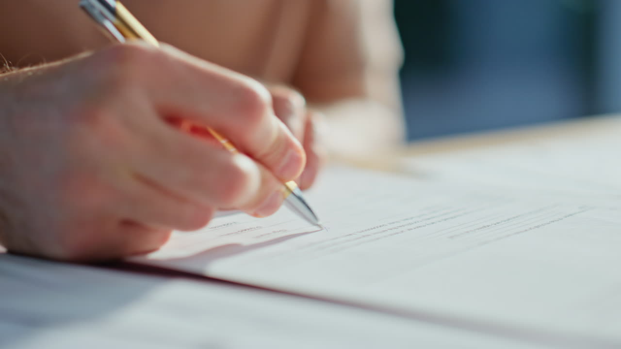 Businessman hands signing contract at business meeting closeup. Man signature