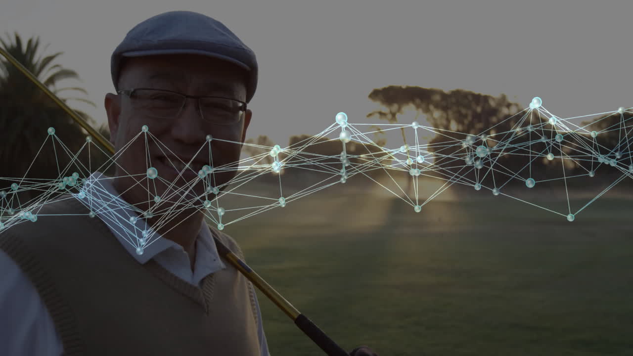 Mature man standing on golf course holding club at sunset, showing technology network overlay