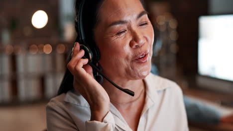 Asian-woman,-call-center-and-consulting-at-night