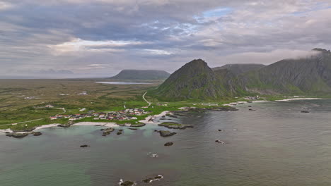 andenes norway v8 drone fly above andfjorden capturing coastal village town towards camping ground surrounded by beautiful nature landscape and mountainscape view - shot with mavic 3 cine - june 2022