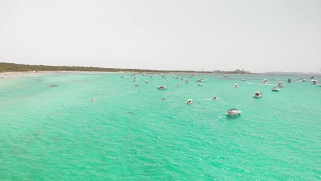 Spain,-Mallorca-Platja-des-Trenc-beach-a-beautiful-fly-by-over-the-beach-at-4k-24-fps-with-ND-filters-on-a-very-bright-day-with-a-DJI-Mavic-Air-drone