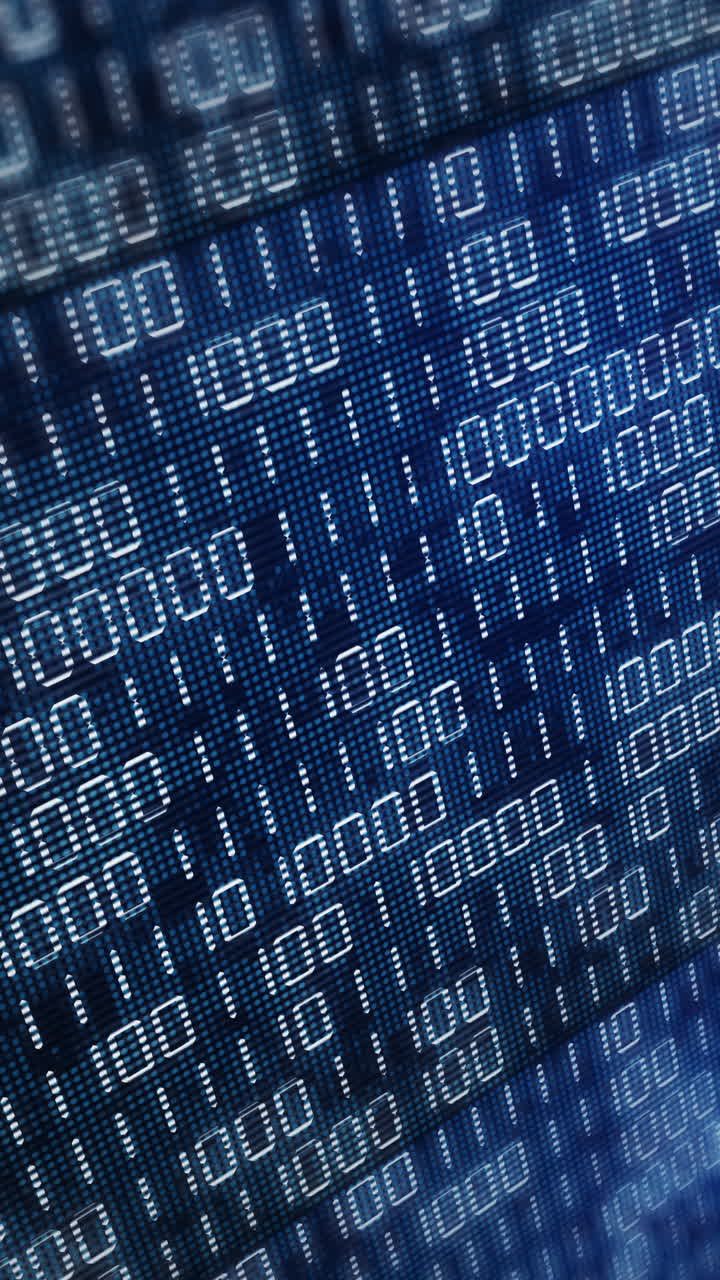 Electronic screen with binary code. Blue display with flickering dots and pixels. Vertical video.
