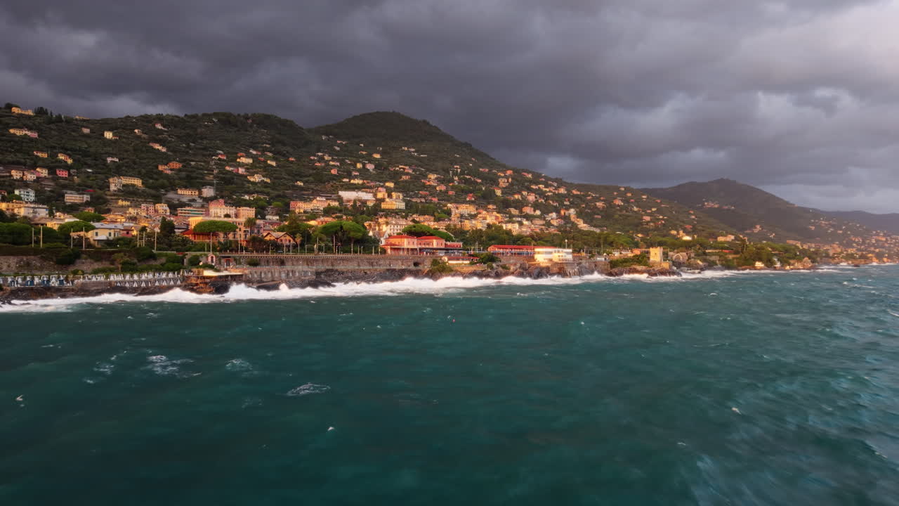 Dramatic coastline view, stormy sky, slow motion sea waves