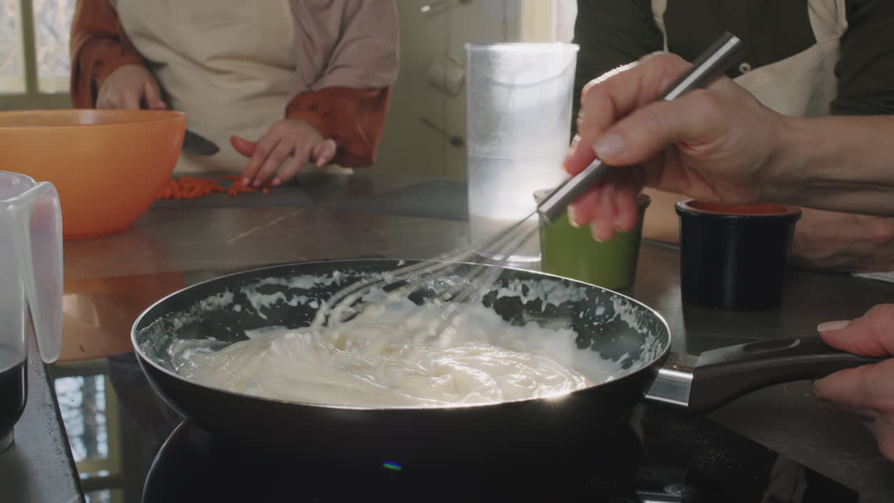 Cooking sauce in a pan