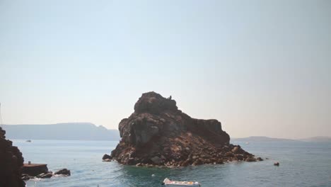 reveal shot of small rocky beach