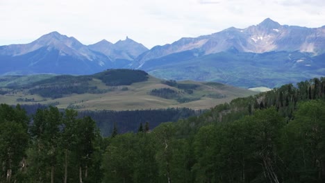 summer last dollar road ridgeway telluride airport colorado aerial drone uncompahgre forest mount sneffels wilderness aspen trees grove vista ranch and san juan rocky mountains dallas range right