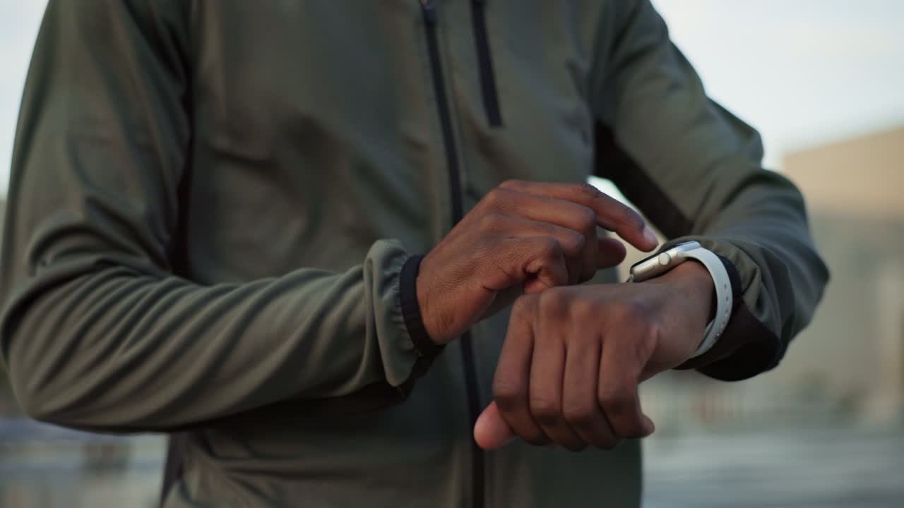 Hands, watch for fitness and a sports man outdoor