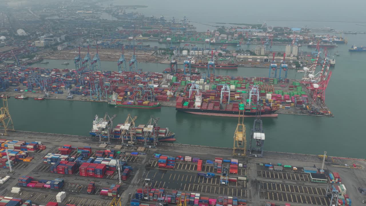 Straight-down view of industrial container storage area in Jakarta harbor