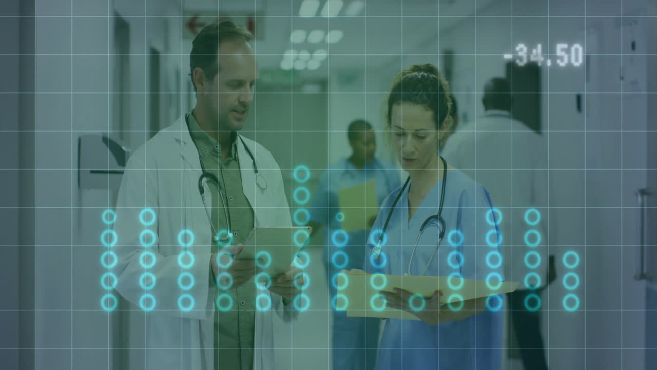 Male doctor and female nurse reviewing medical records in hospital, showing glowing data grid
