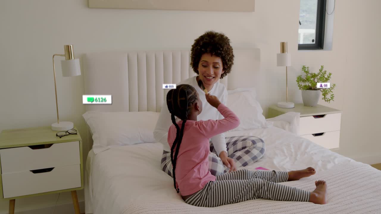 Mother and child on bed, child picking brush and doing makeup during live stream, likes multiplying