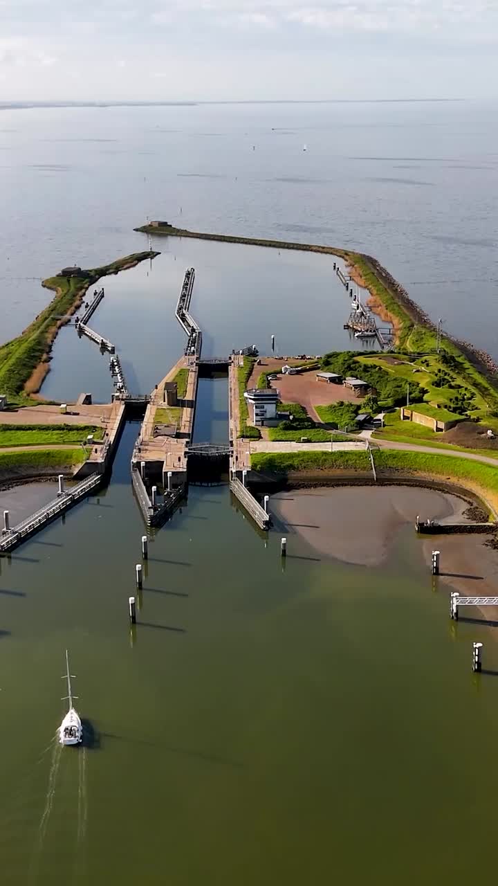 Aerial view of a canal lock and harbor