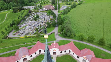 pullback reveal of star-shaped pilgrimage church of saint john of nepomuk at zelena hora in czech republic. aerial shot