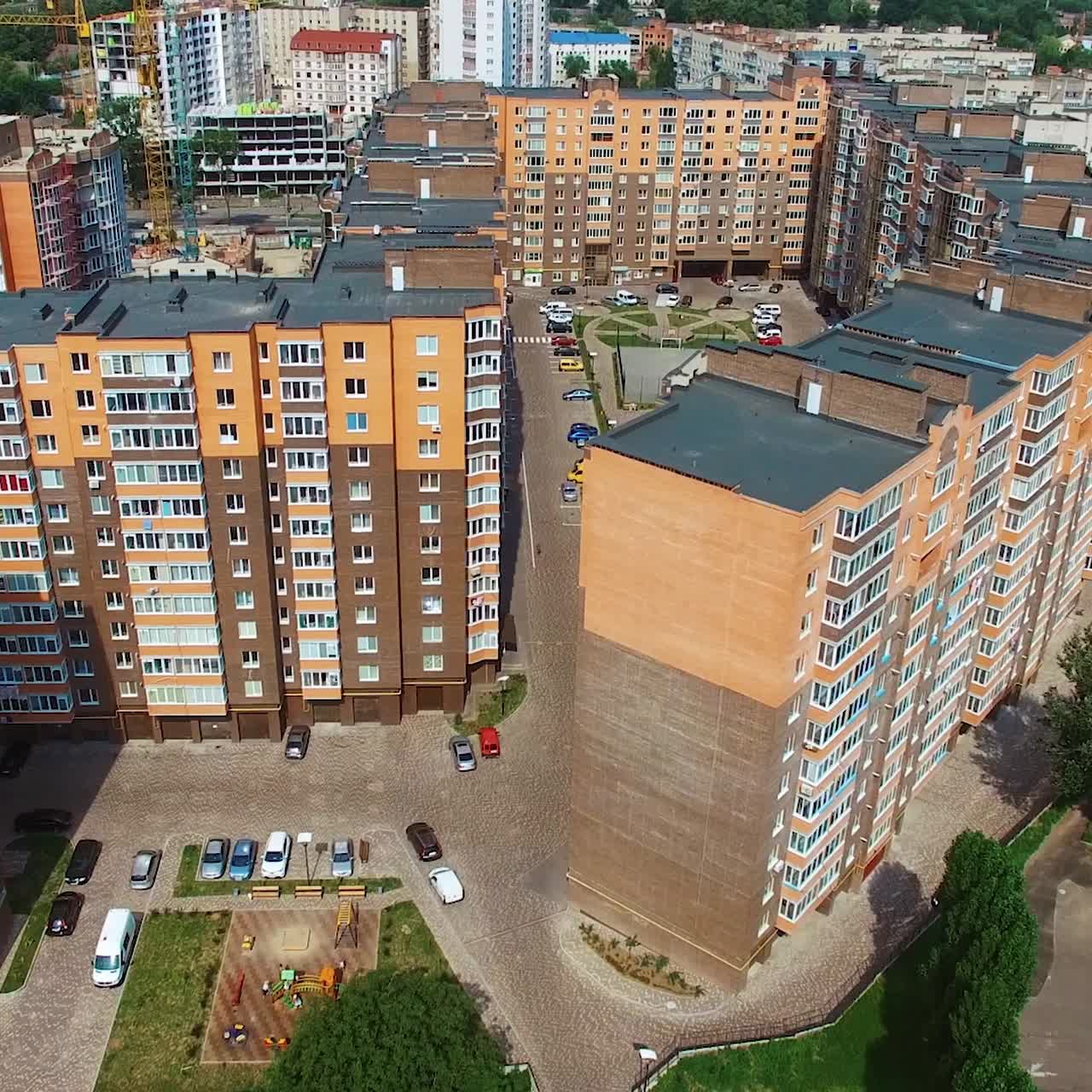 New apartments build in the city center. Modern urban district with architecture. Exterior of comfortable high-raised buildings.