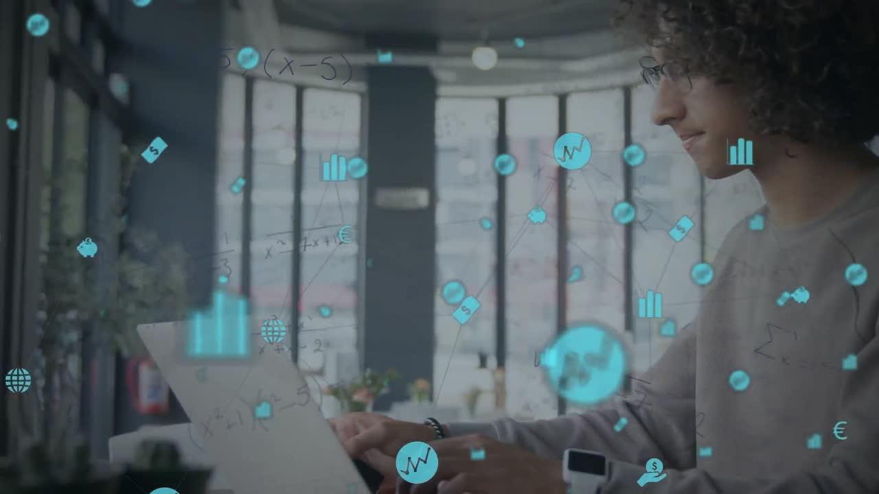 Animation of globe with connections and icons over biracial businessman using laptop