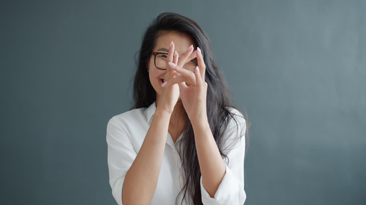 Woman in glasses smiling