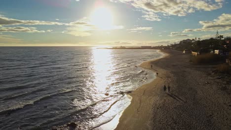 aerial view of a beach sunset in slow motion